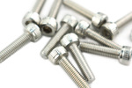 Overhead shot of 10 sets low profile hex head cap screws in silver on white background.
